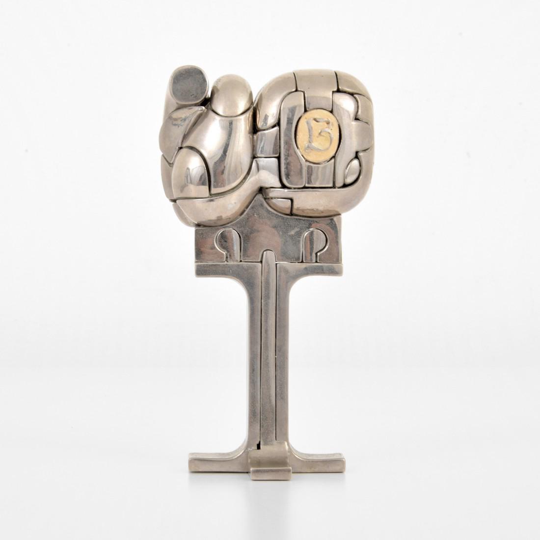 Miguel Berrocal MINI CRISTINA Sculpture & Book: Designer & Manufacturer: Miguel Berrocal (1933-2006) Markings: signed; 3651 Country of Origin & Materials: Spanish; metal Additional Information: Sculpture is comprised of twenty three elements and in