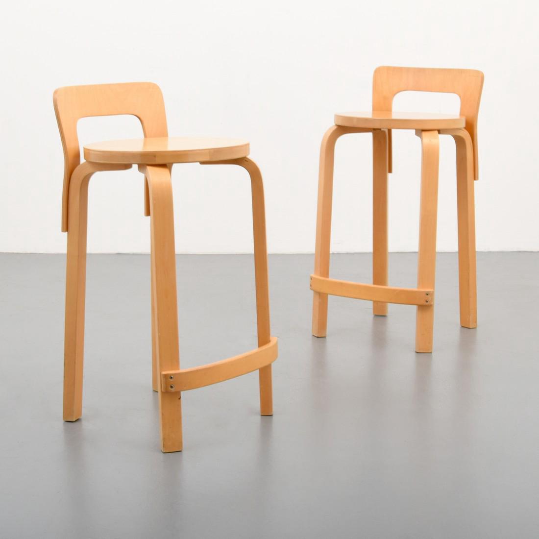 Pair of Alvar Aalto K65 Bar Stools: Designer & Manufacturer: Alvar Aalto; ICF Markings: ICF New York/made in Finland label Country of Origin & Materials: Finland; birch wood Additional Information: Modern Art, Design & Luxury | Palm Bea