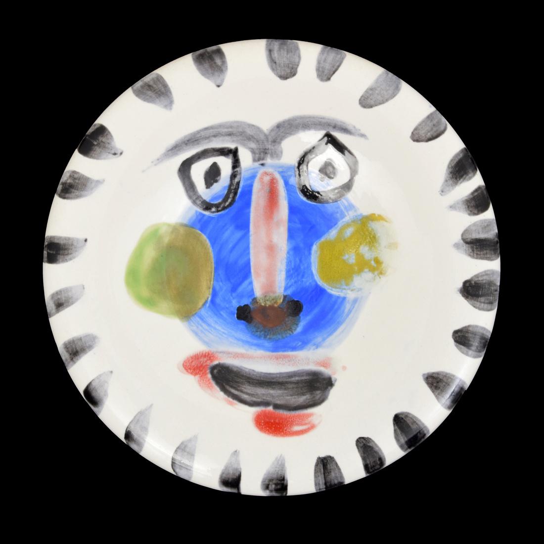 Pablo Picasso VISAGE NO. 202 Plate (A.R. 495): Designer (Artist) & Manufacturer: Pablo Picasso (Spanish, 1881-1973); Madoura Markings: Edition Picasso mark, Madoura mark, N'202 mark (marks are under the glaze), R1 imprint; ed. 33/500 Country of Or