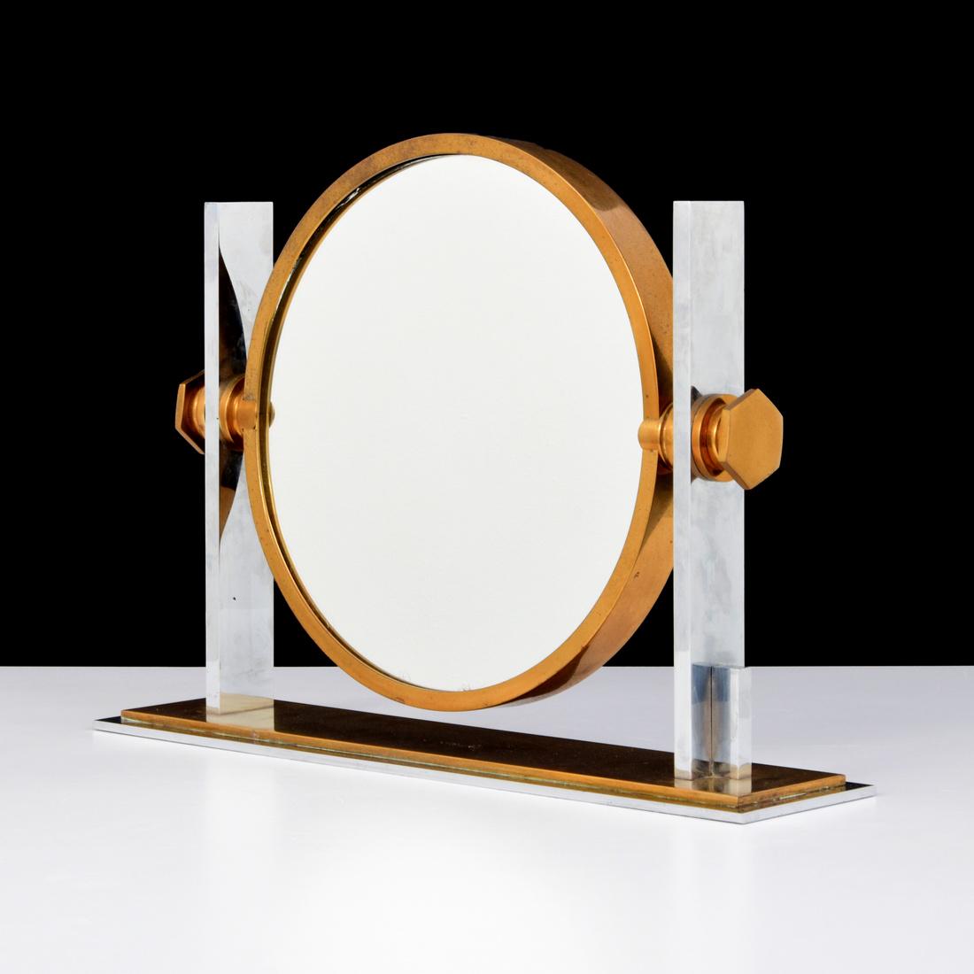 Karl Springer Double-Sided Table Mirror: Designer (Artist) & Manufacturer: Karl Springer; Karl Springer Ltd. Markings: no marking(s) apparent Country of Origin & Materials: USA; brass, chromed metal possibly nickel, mirrored glass Additional