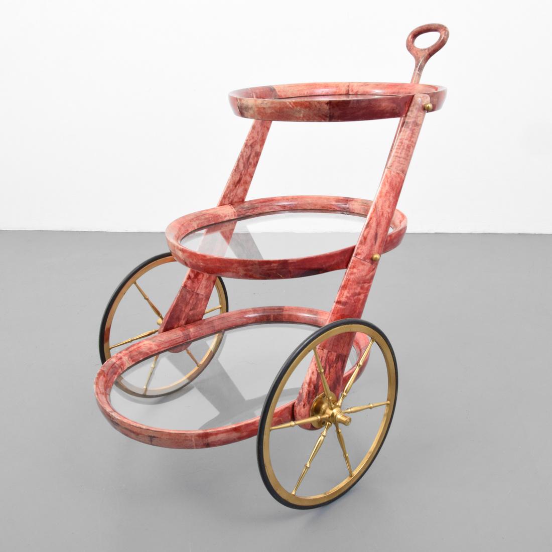 Aldo Tura Bar Cart: Designer (Artist) & Manufacturer: Aldo Tura Markings: no marking(s) apparent Country of Origin & Materials: Italy; brass, parchment, glass Additional Information: Wheeled cart has three tiers. Dimensi