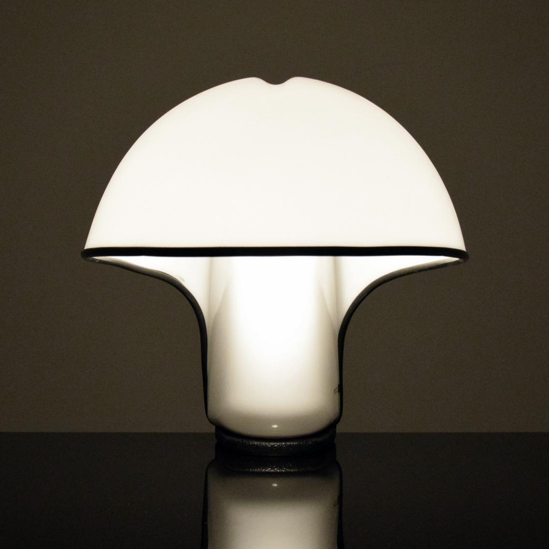 Harvey Guzzini Table Lamp: Designer (Artist) & Manufacturer: Harvey Guzzini Markings: Harvey Guzzini label, Art 4021 label Country of Origin & Materials: Italy; plastic, rubber, metal Additional Information: Provenance: Van Den