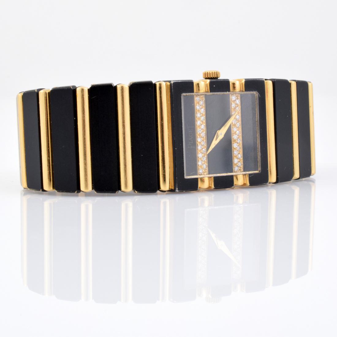 Piaget Ladies 18K Gold & Diamond Watch: Designer (Artist) & Manufacturer: Piaget Markings: Piaget Quartz imprint, 8131C701 443265; 185 Country of Origin & Materials: Switzerland; 18K yellow gold, diamond, other Additional Information: Piage