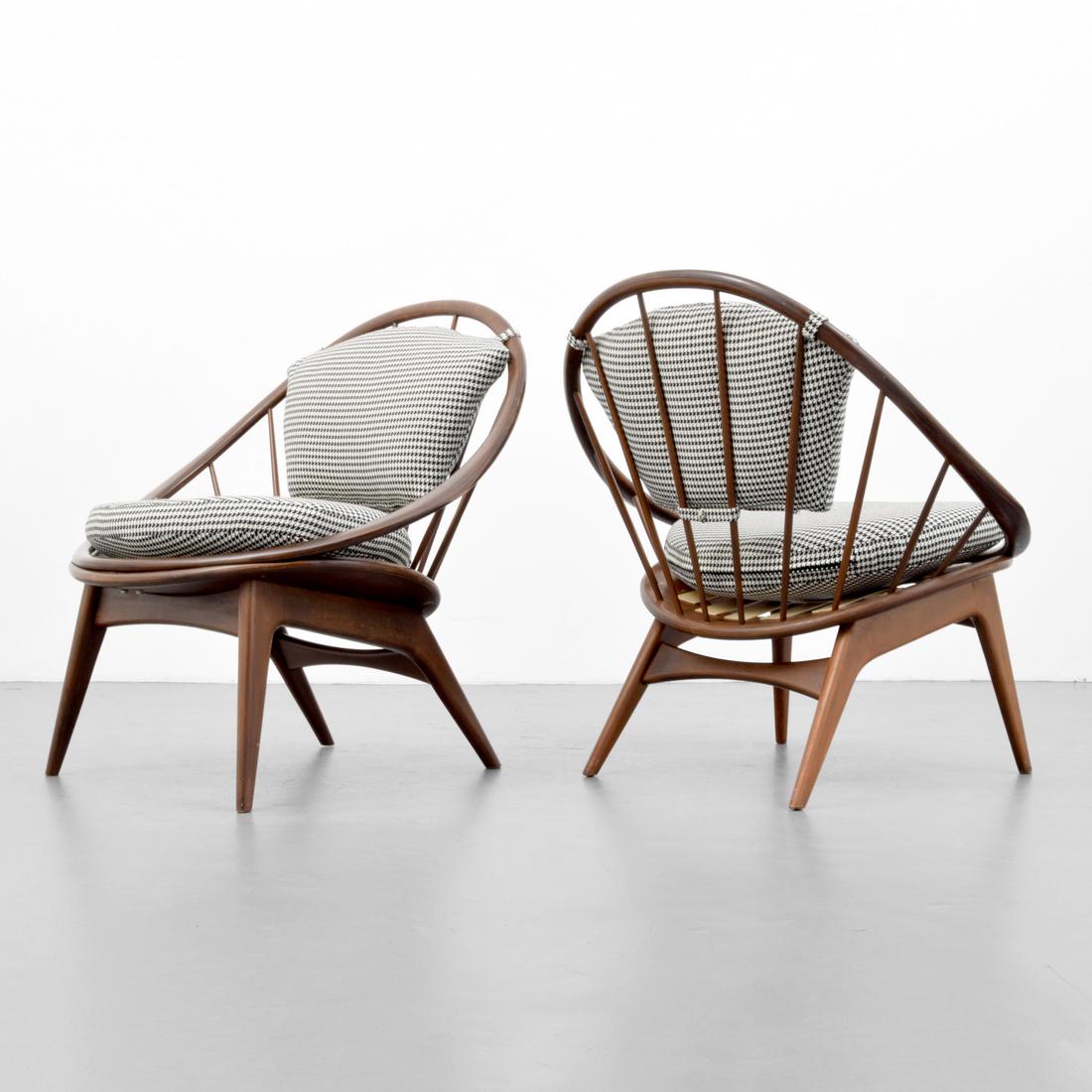 Pair of Ib Kofod-Larsen HOOP Chairs: Designer (Artist) & Manufacturer: Ib Kofod-Larsen Markings: Made and Finished in Denmark Imported by Selig tag Country of Origin & Materials: Denmark; wood, upholstery, rubber Additional Information:
