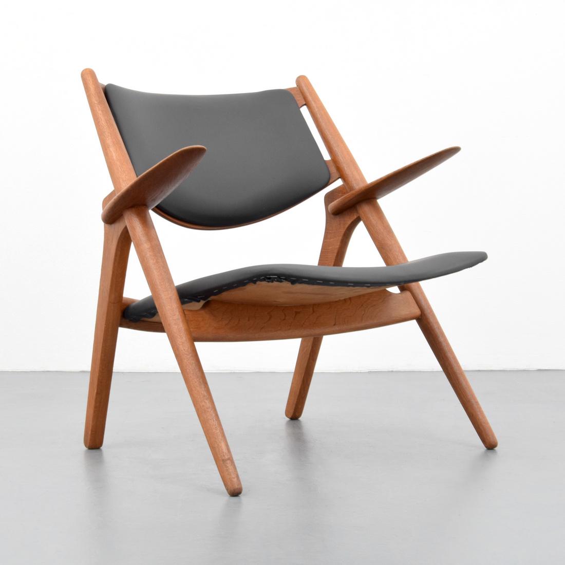 Hans Wegner SAWBUCK Arm Chair: Designer (Artist) & Manufacturer: Hans Wegner; Carl Hansen & Son Markings: Hans Wegner/Carl Hansen & Son brand Country of Origin & Materials: Denmark; wood, leather Additional Information: Chair is mo