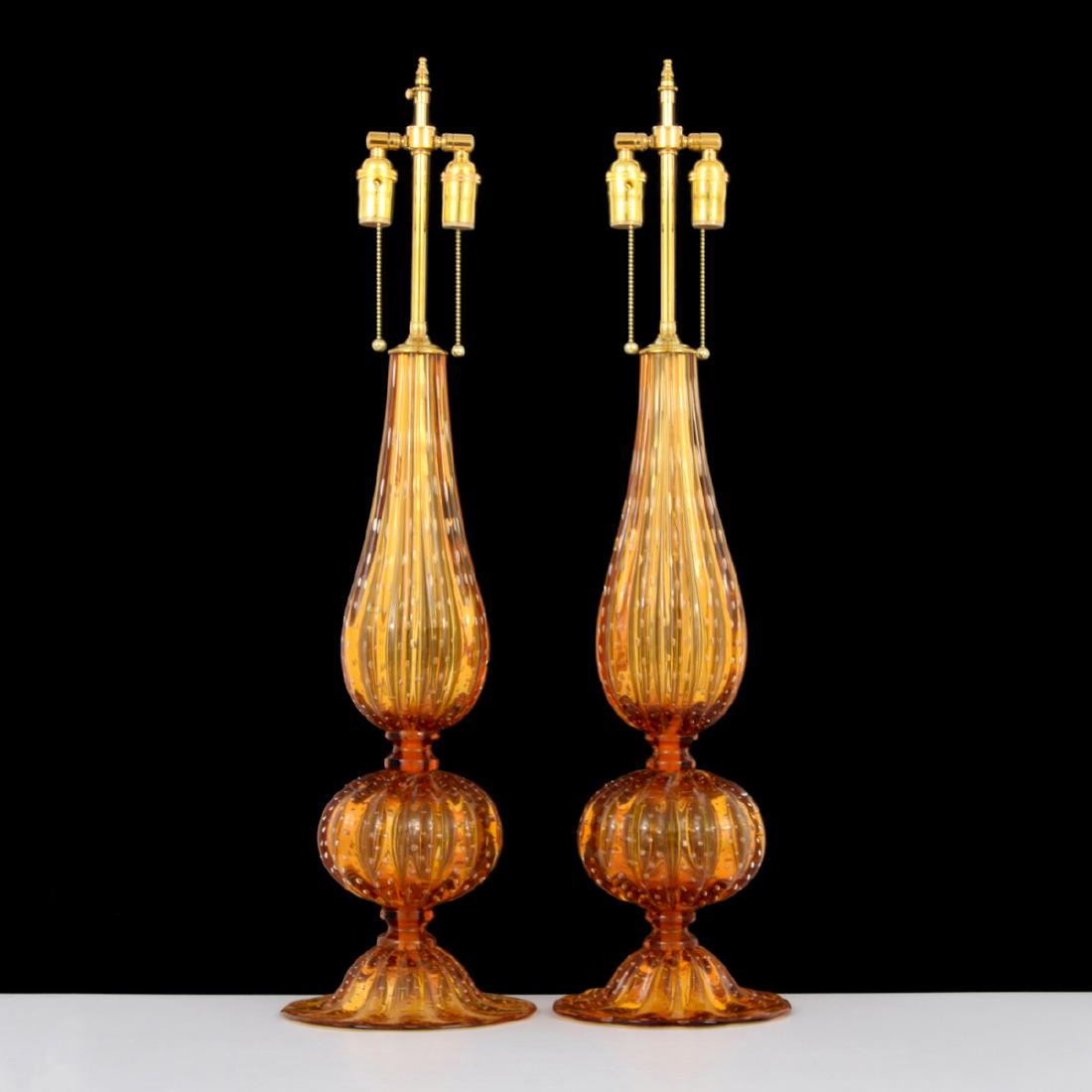 Pair of Alberto Dona Lamps, Murano: Designer/Artist & Manufacturer: Alberto Dona Markings: signed Country of Origin & Materials: Italy; glass, brass Additional Information: Lamps have two adjustable light sockets and controlled bubbles