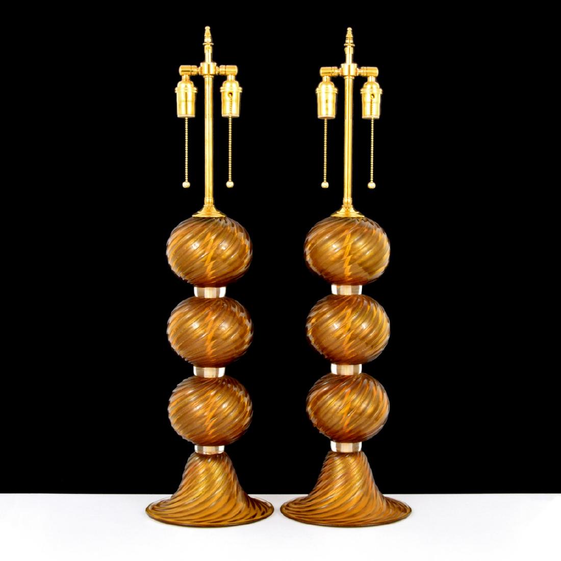 Pair of Alberto Dona Lamps, Murano: Designer/Artist & Manufacturer: Alberto Dona Markings: signed Country of Origin & Materials: Italy; glass, brass Additional Information: Lamps have two adjustable light sockets and gold aventurine thr