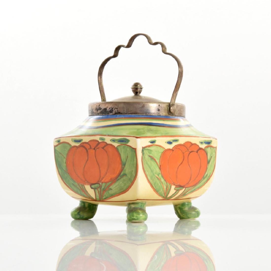 Clarice Cliff ORANGE LILY Lidded Biscuit Barrel: Designer/Artist & Manufacturer: Clarice Cliff (English, 1899-1972) Markings: signed, marking(s) Country of Origin & Materials: England; hand-painted on ceramic, metal Additional Information: Provenanc