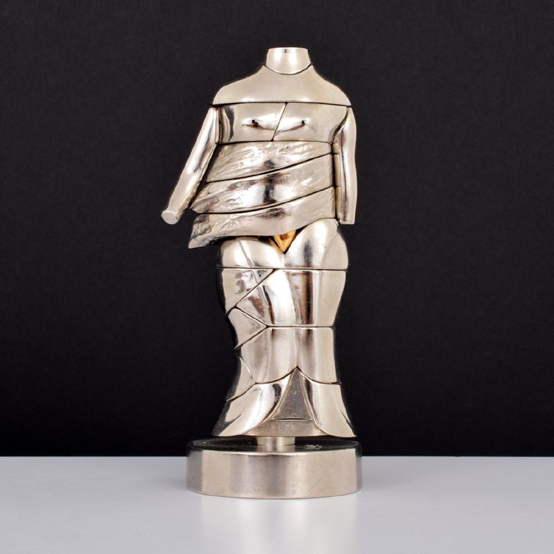 Miguel Berrocal MINI CARIATIDE Sculpture/Puzzle: Designer/Artist & Manufacturer: Miguel Berrocal (1933-2006) Markings: signed, marking(s); ed. 8626/9500 Country of Origin & Materials: Spanish; nickel-plated zamak Additional Information: Lot includes