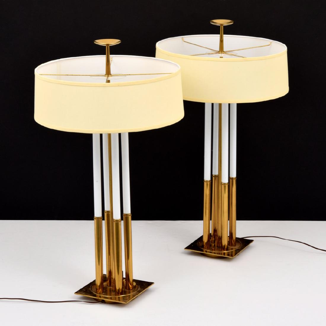Pair of Stiffel Table Lamps, Manner of Tommi Parzinger: Designer/Artist; Manufacturer: Tommi Parzinger, manner of; Stiffel Markings: Stiffel label Country of Origin & Materials: USA; brass, enameled metal Additional Information: Lamps have three standard a