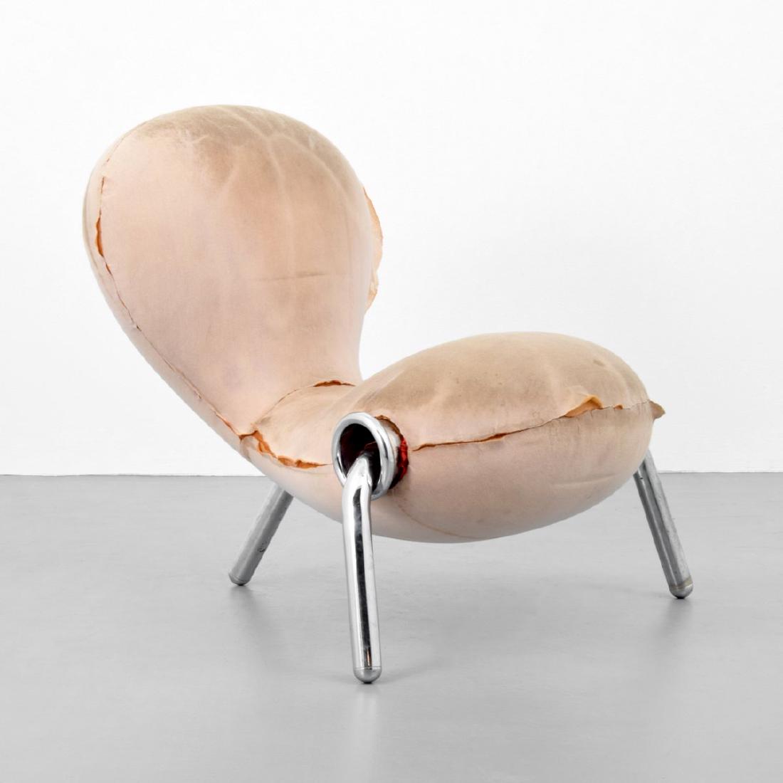 Marc Newson EMBRYO Chair: Designer/Artist; Manufacturer: Marc Newson; Cappellini Markings: no marking(s) apparent Country of Origin & Materials: Italy; aluminum, upholstery Additional Information: This lot is from the personal