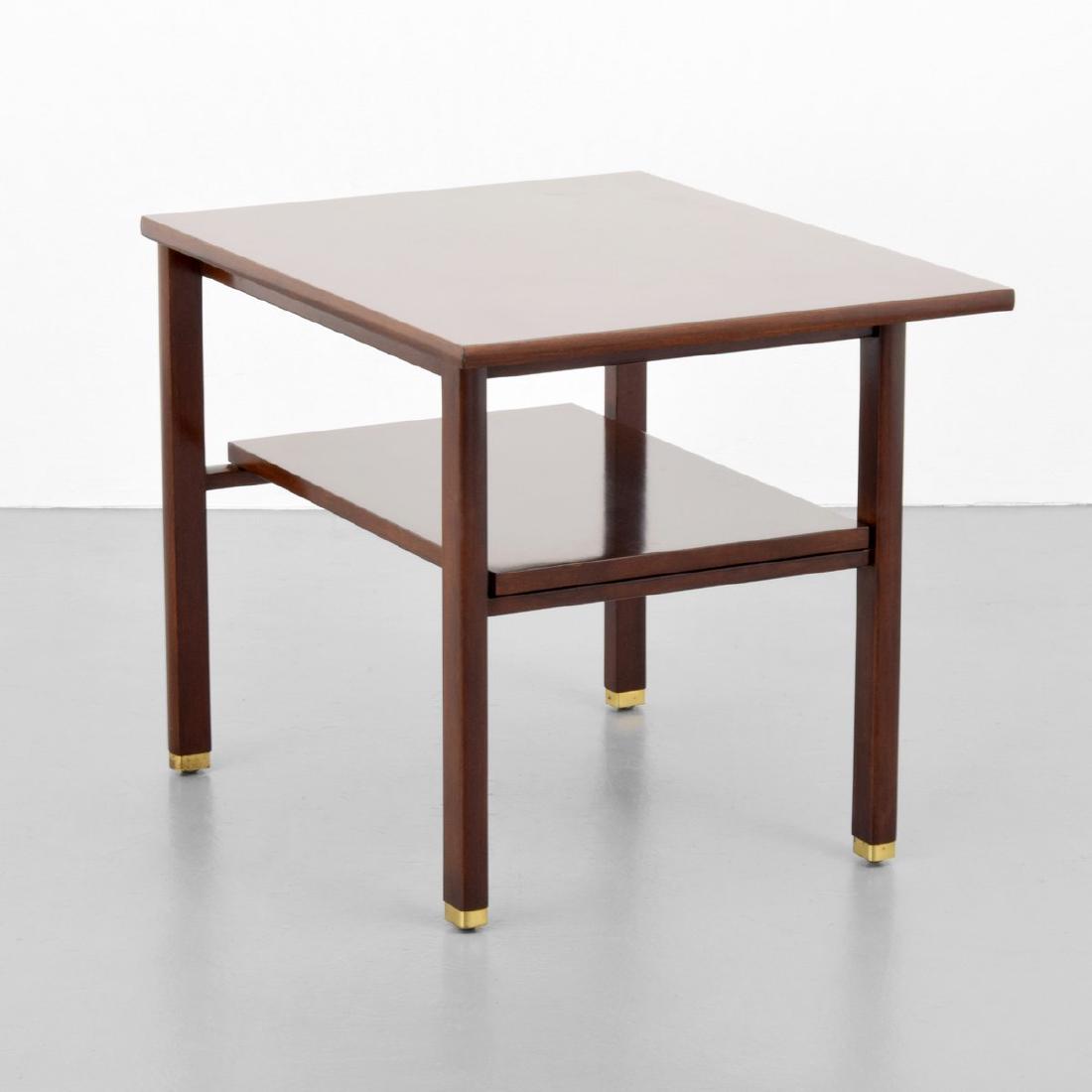 Edward Wormley Side/End Table: Designer/Artist; Manufacturer: Edward Wormley; Dunbar Markings: Dunbar plaque Country of Origin & Materials: USA; wood, brass Additional Information: Table has a lower shelf and brass sabots. Property
