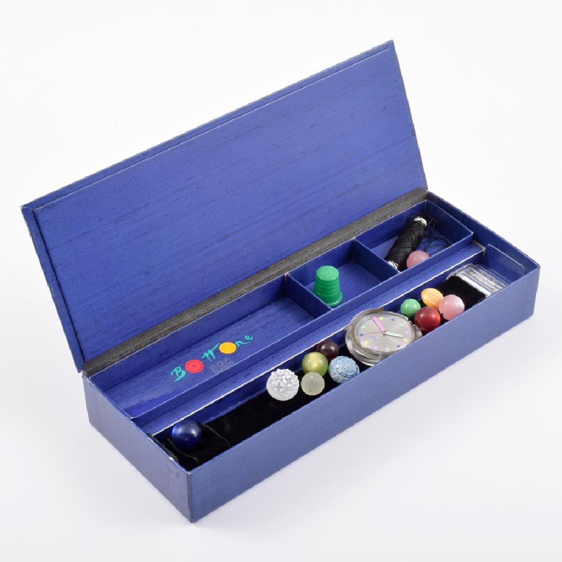 Vintage Swatch "Bottone" Watch: Designer/Artist; Manufacturer: Swatch Markings: marking(s) Country of Origin & Materials: Switzerland; metal, plastic, velvet, thread Additional Information: Water resistant quartz watch with ten atta
