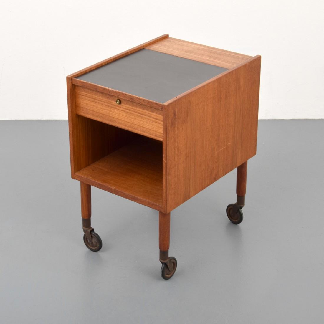 Bar/Table/Stand, Manner of Hans Wegner: Designer/Artist; Manufacturer: Hans Wegner, manner of Markings: made in Sweden stamp Country of Origin & Materials: Sweden; wood, metal, laminate Additional Information: Wheeled table has a key which