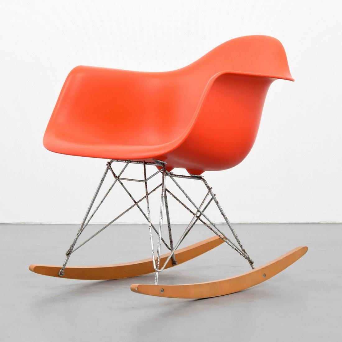 Charles & Ray Eames "RAR" Rocking Chair: Designer/Artist; Manufacturer: Charles & Ray Eames; Vitra Markings: Charles & Ray Eames/Vitra imprint, Eames Office label Country of Origin & Materials: Germany; chromed metal, plastic, wood Additiona