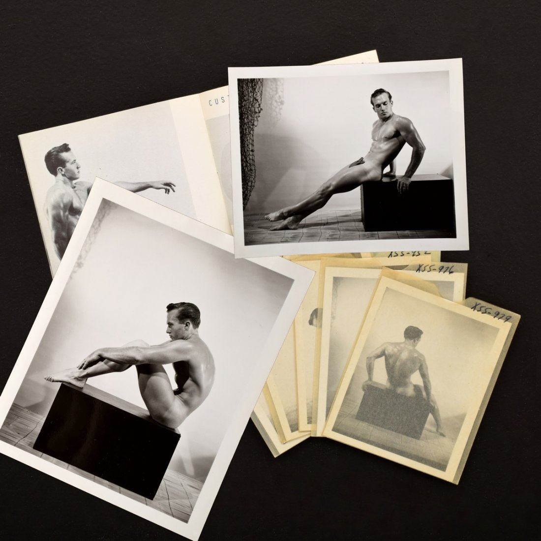 5 Bruce Bellas Nude Male Photos, Negatives,& Catalog: Designer/Artist; Manufacturer: Bruce Bellas (1909-1974), aka Bruce of Los Angeles Markings: Marking(s); sleeves numbered X55-952, X55-953, X55-975, X55-976, X55-979; divider dated 1955. Some lots in