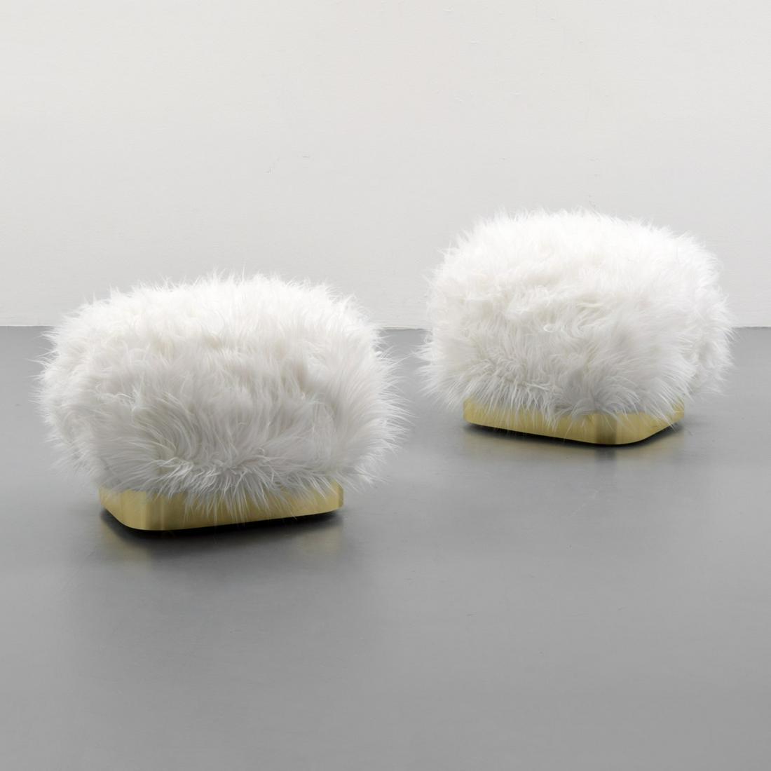 Pair of Karl Springer-Style Wheeled Ottomans/Poufs: Designer/Artist; Manufacturer: Karl Springer, manner of Markings/Notes: no marking(s) apparent Country of Origin & Materials: country of origin unknown; metal, wood, upholstery Additional Information: