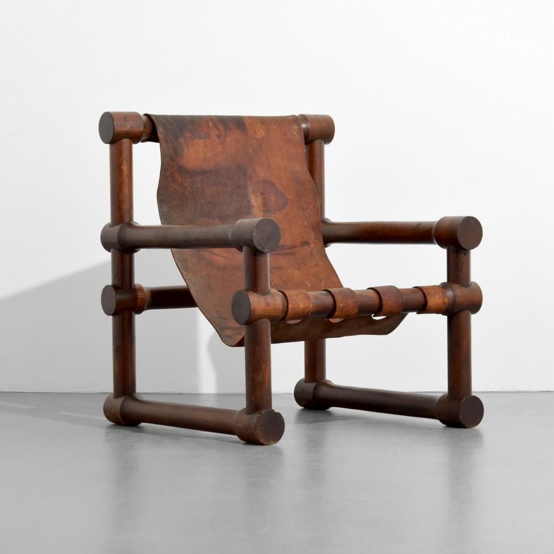 Leather Sling Lounge Chair, Manner of Sergio Rodrigues: Designer/Artist; Manufacturer: Sergio Rodrigues, manner of Markings/Notes: no marking(s) apparent Country of Origin & Materials: country of origin unknown; wood, leather Additional Information: 20th C