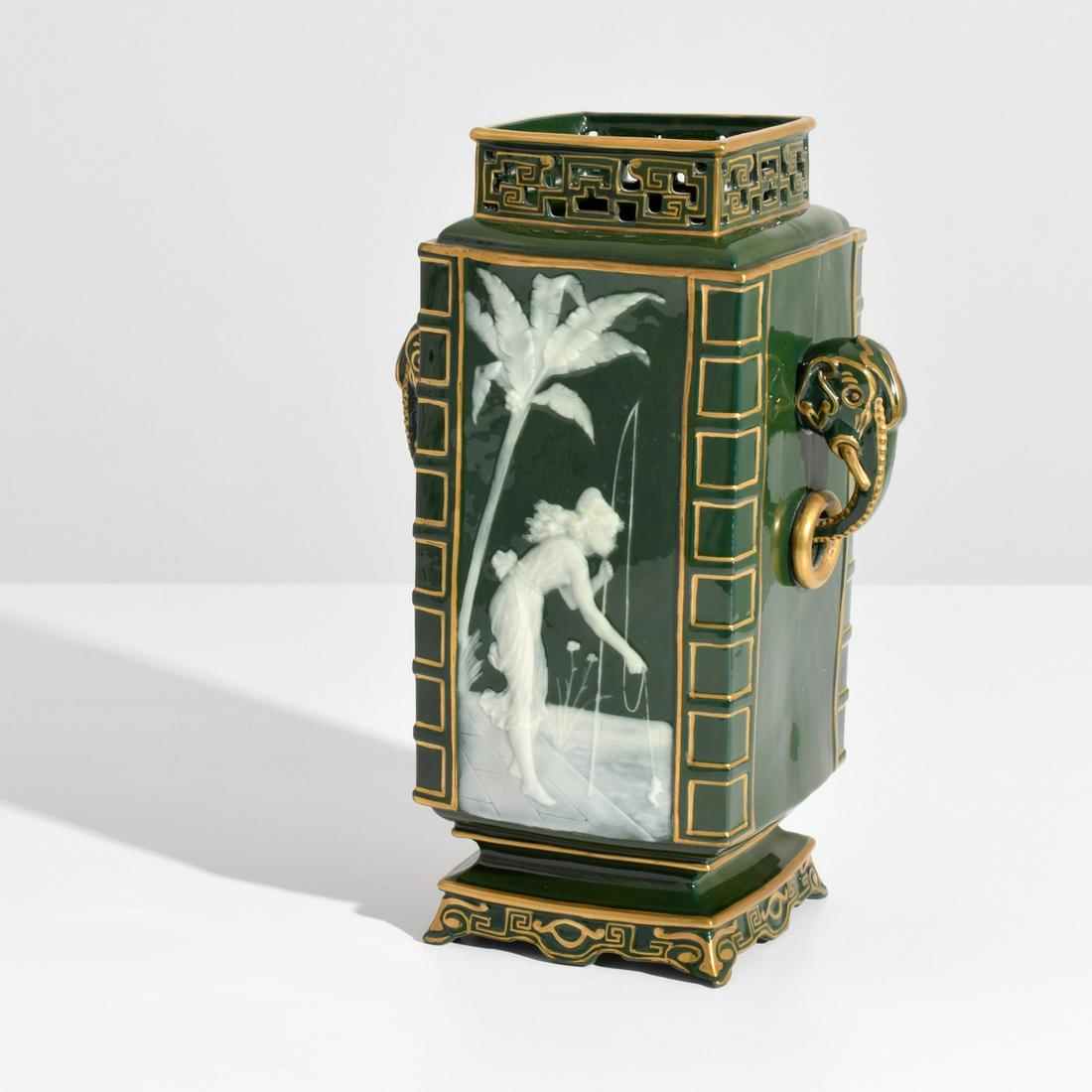 George Jones "Pate Sur Pate" Vase: Designer & Manufacturer: George Jones Markings/Notes: no marking(s) apparent Country of Origin & Materials: United Kingdom; porcelain Dimensions(H,W,D): 10"h, 6.5"w, 4.5"d Additional Information: