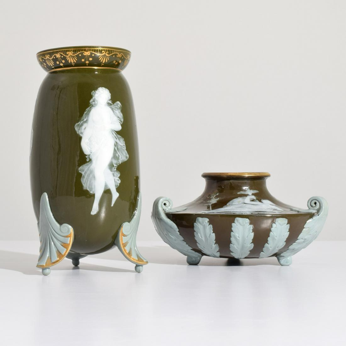 2 George Jones "Pate Sur Pate" Vases: Designer & Manufacturer: George Jones Markings/Notes: one vase with 5668 Country of Origin & Materials: United Kingdom; porcelain Dimensions(H,W,D): 8"h, 4"dia; 4"h, 7.5"dia Additional Information:</