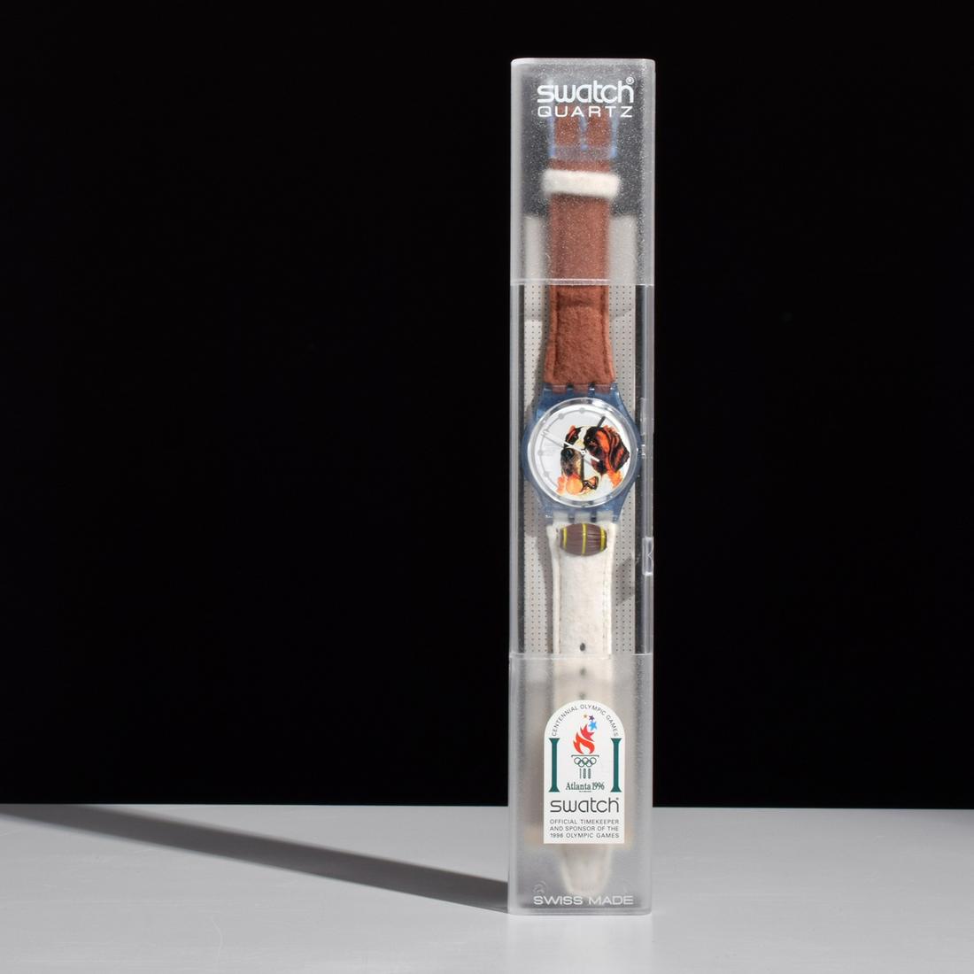 Vintage "Barry" Swatch Watch: Designer & Manufacturer: Swatch Markings/Notes: Swatch imprints, marking(s) Country of Origin & Materials: Switzerland; leather, plastic, other Dimensions(H,W,D): band: 9"l; face: 1.25"w Additional I