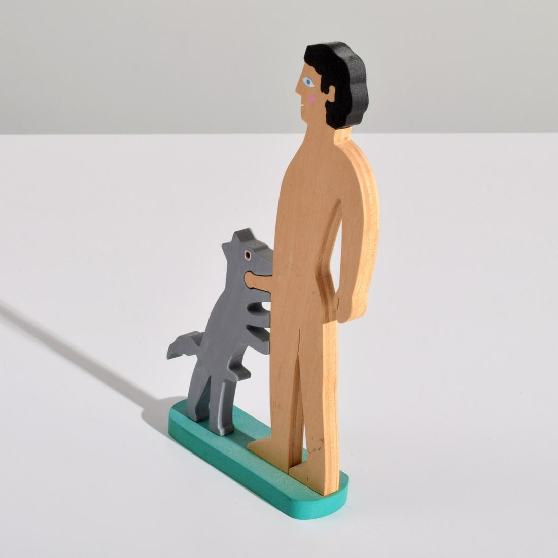 William Accorsi Erotic Puzzle Sculpture, Man & Dog: Designer & Manufacturer: William Accorsi (b. 1931) Markings/Notes: signed; 1993 Country of Origin & Materials: American; painted wood Dimensions(H,W,D): 8.25"h, 4.25"w, 1.5"w Additional Information:<