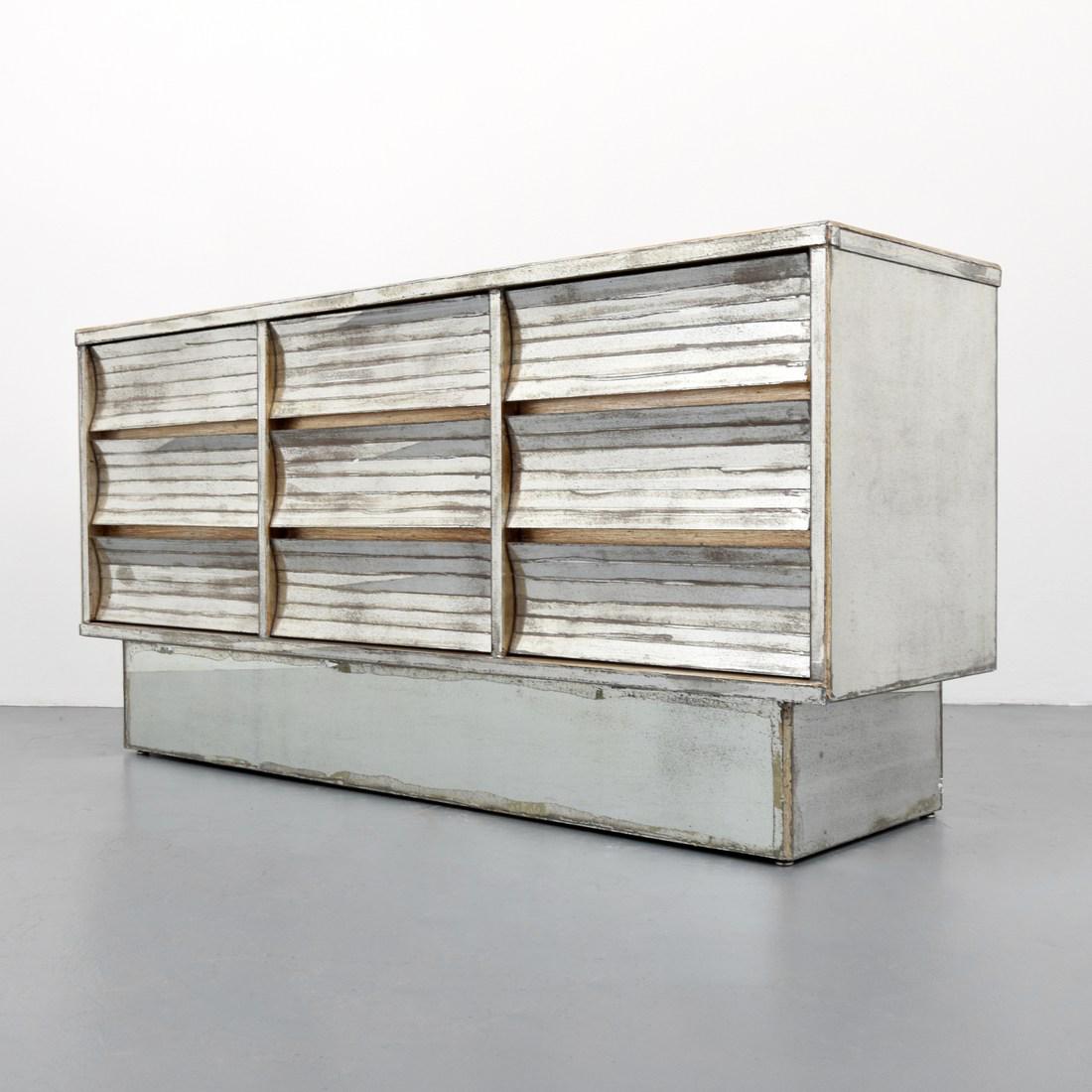 Antiqued Silver Leaf & Mirrored Cabinet/Dresser: Designer/Artist; Manufacturer: unknown Markings/Notes: no marking(s) apparent Country of Origin & Materials: country of origin unknown; antiqued mirror, silver leaf Additional Information: Cabinet has