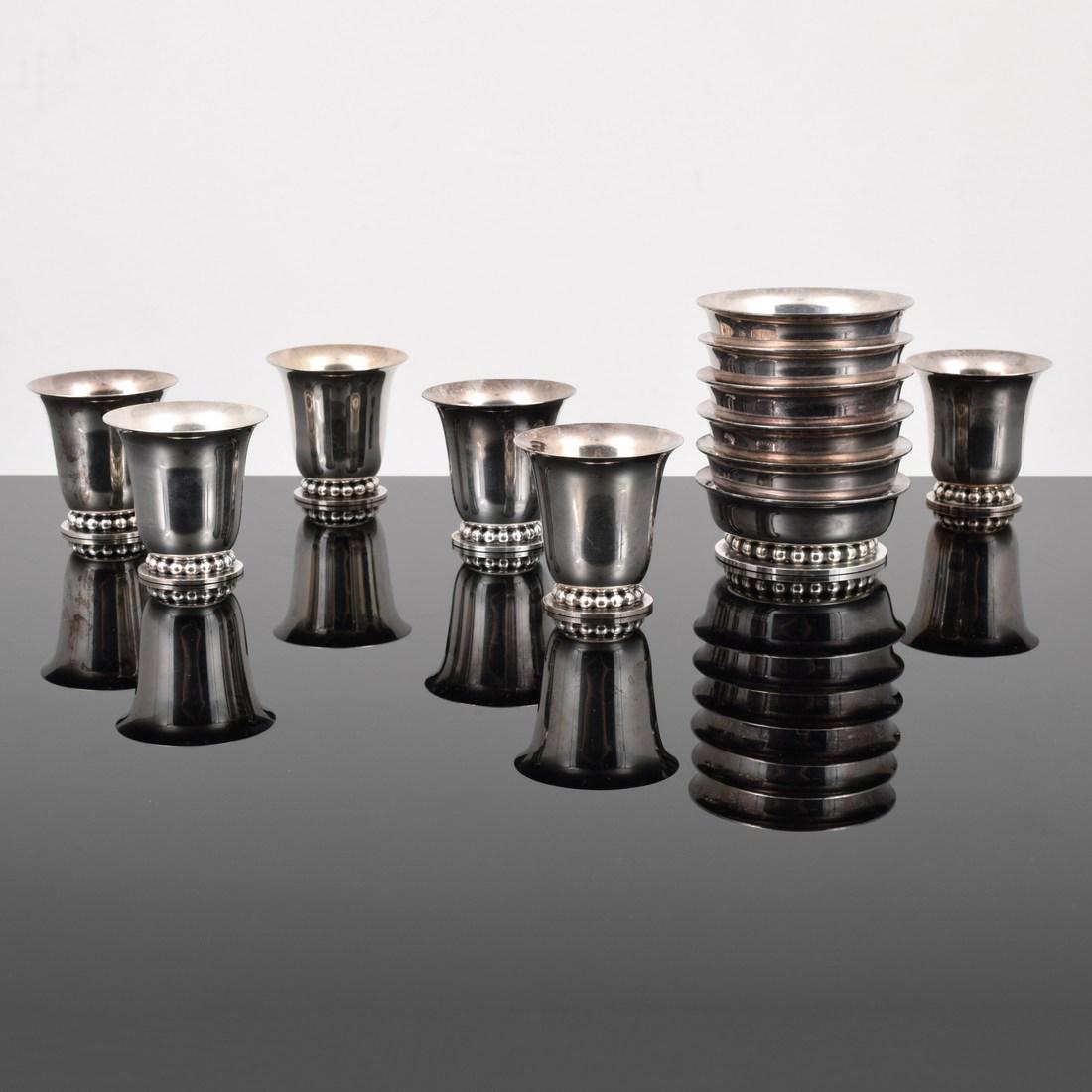 6 Carole Stupell Salt Cellars & 6 Liqueur Glasses: Designer/Artist; Manufacturer: Carole Stupell Markings/Notes: Made Exclusively For Carole Stupell, A1647 Country of Origin & Materials: USA; appears to be silver plate Additional Information: Founded 