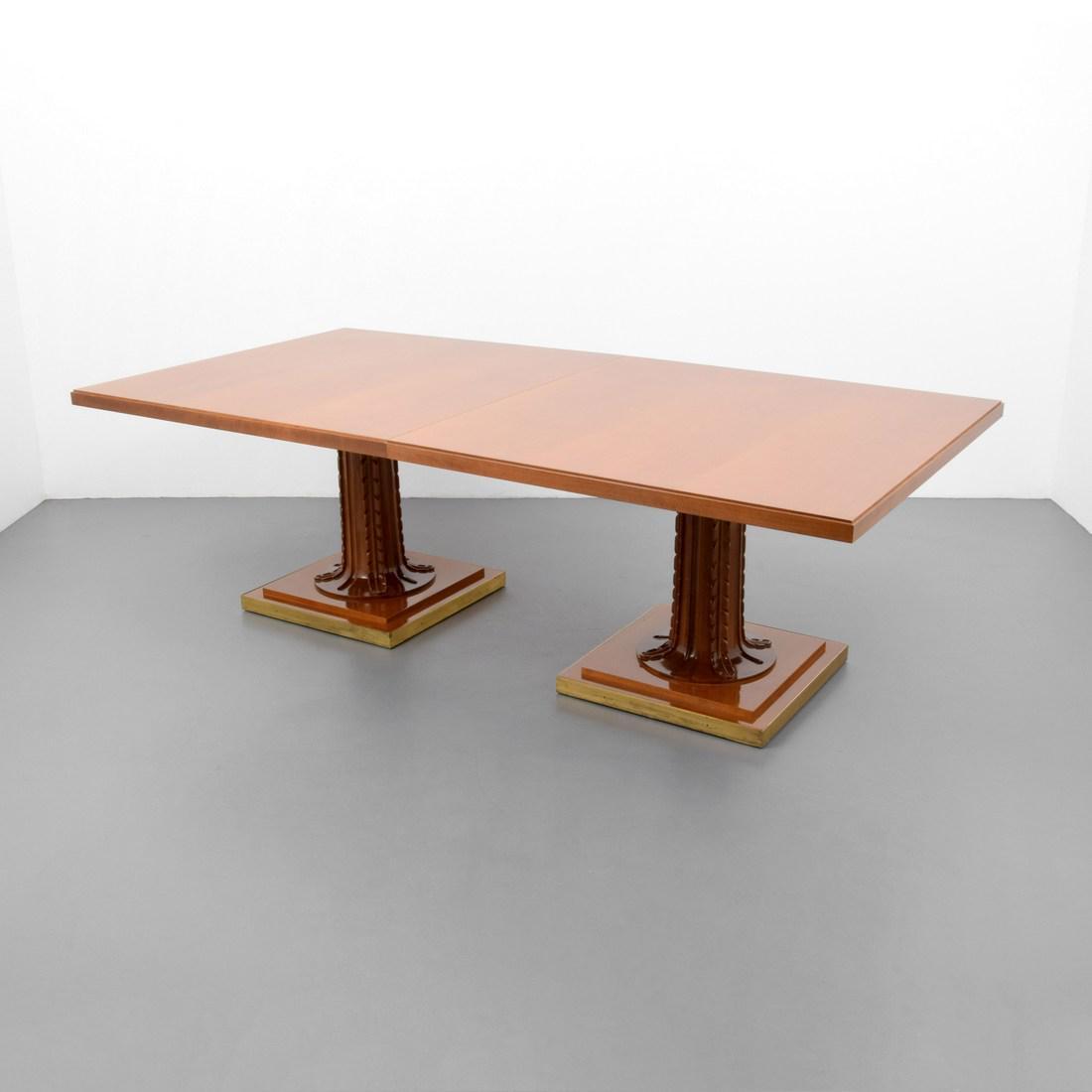 Monumental T.H. Robsjohn-Gibbings Dining Table, Saridis: Designer/Artist; Manufacturer: T.H. Robsjohn-Gibbings; Saridis of Athens Markings/Notes: T.H. Robsjohn-Gibbings/Saridis of Athens label, plaque and brand Country of Origin & Materials: Greece; walnut,