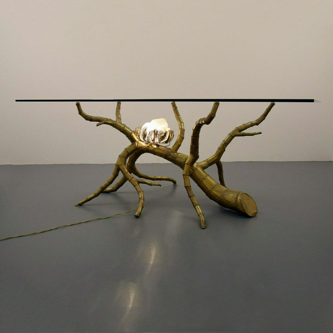 Rare Jacques Duval-Brasseur Illuminated Dining Table: Artist/Designer; Manufacturer: Jacques Duval-Brasseur Marking(s); notes: no marking(s) apparent Country of origin; materials: France; brass, quartz, glass Description: Flora, fauna and figures imitate