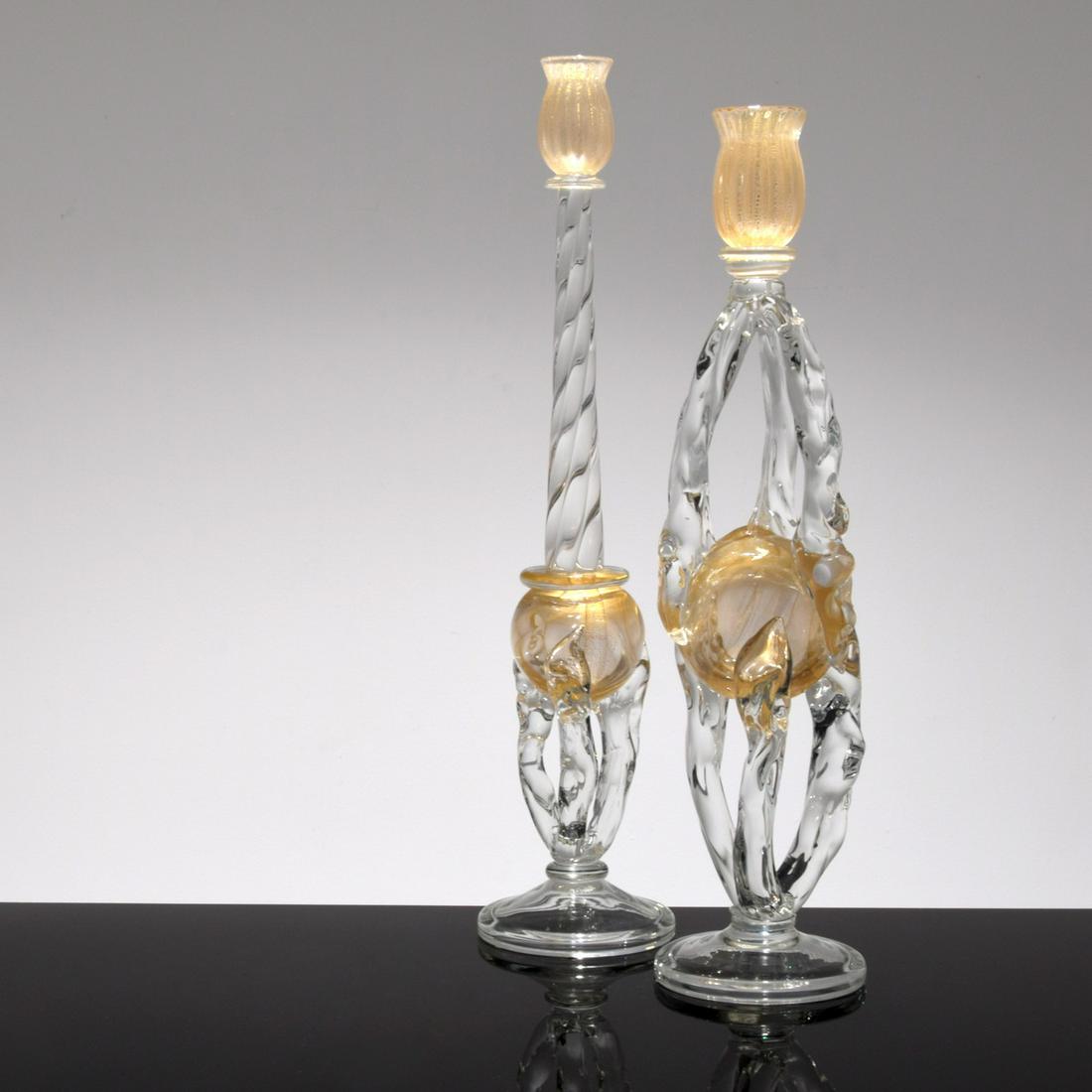 Pair of Large Seguso Candlesticks, Murano: Artist/Designer; Manufacturer: Seguso Viro Marking(s); notes: signed Country of origin; materials: Italy; glass Description: Candlesticks have gold aventurine. Dimensions (H, W, D): 27"h, 5.5"dia; 25"