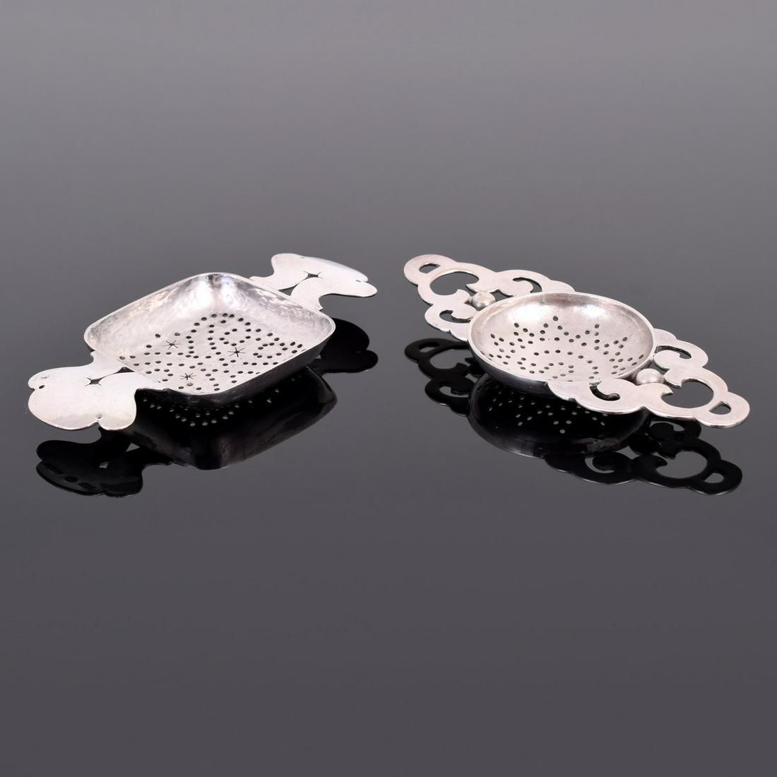 2 William Spratling Sterling Silver Tea Strainers: Artist/Designer; Manufacturer: William Spratling Marking(s); notes: William Spratling hallmark, Taxco, 980 Country of origin; materials: Mexico; sterling silver Description: One strainer with pierced 