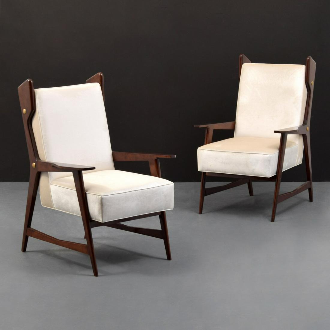 Rare Pair of Gio Ponti Lounge Chairs, COA: Artist/Designer; Manufacturer: Gio Ponti; Melchiorre Bega Marking(s); notes: Documento Autentico XA00005576 label Country of origin; materials: Italy; walnut, upholstery, brass Dimensions (H, W, D): 4