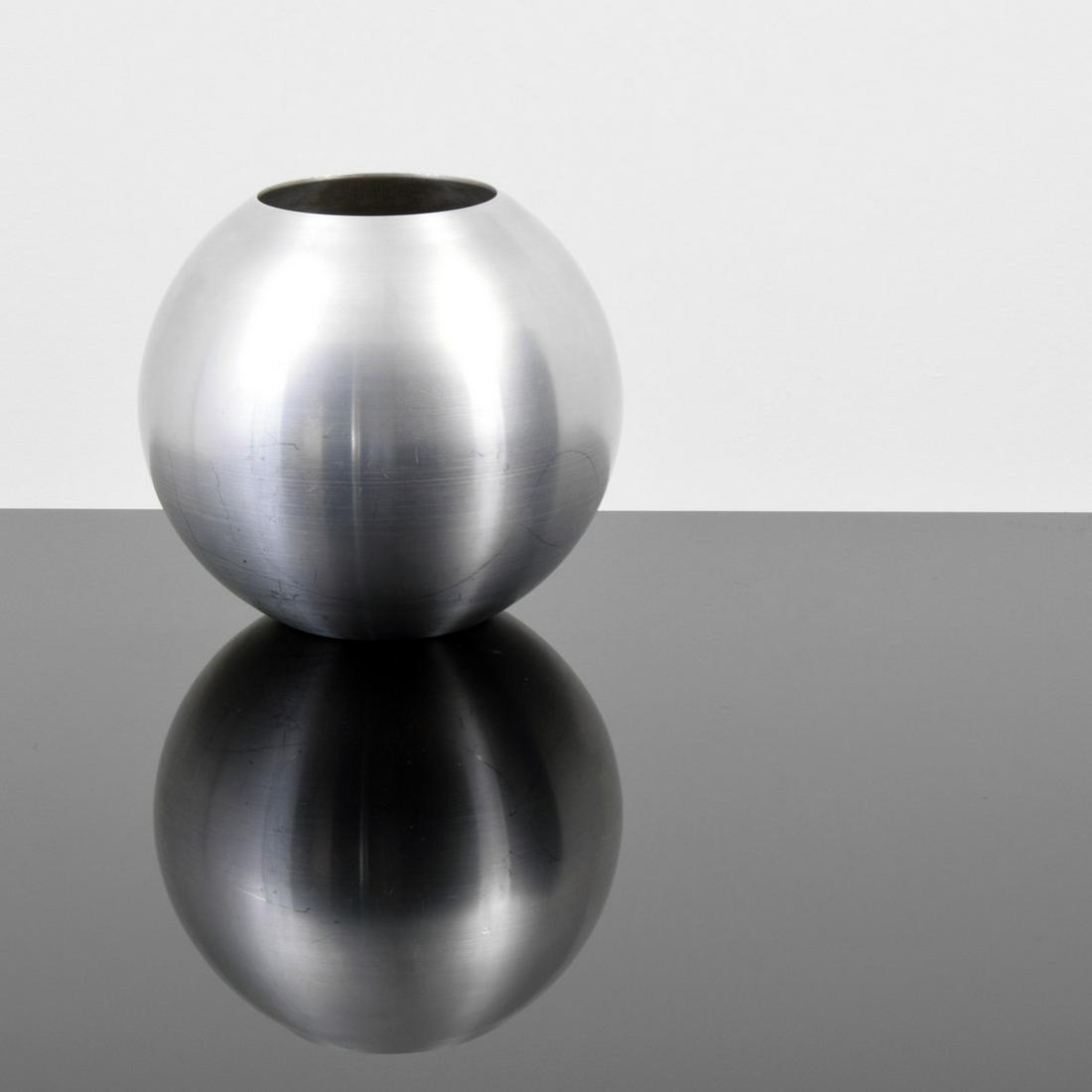 Large Russel Wright Ball Vase: Artist/Designer; Manufacturer: Russel Wright; Raymor Marking(s); notes: Russell Wright imprint, HK Country of origin; materials: USA; spun aluminum Dimensions (H, W, D): 9.25"h, 9.25"dia Additional In