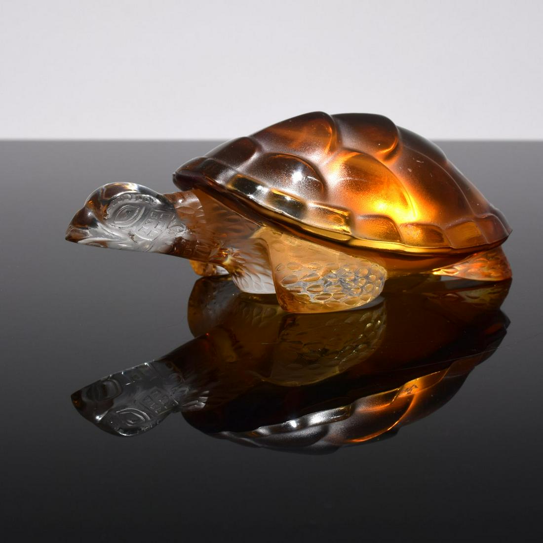 Lalique "Caroline" Turtle Paperweight/Sculpture: Artist/Designer; Manufacturer: Lalique Marking(s); notes: signed Country of origin; materials: France; glass Dimensions (H, W, D): 2"h, 5.75"w, 3.5"d Additional I