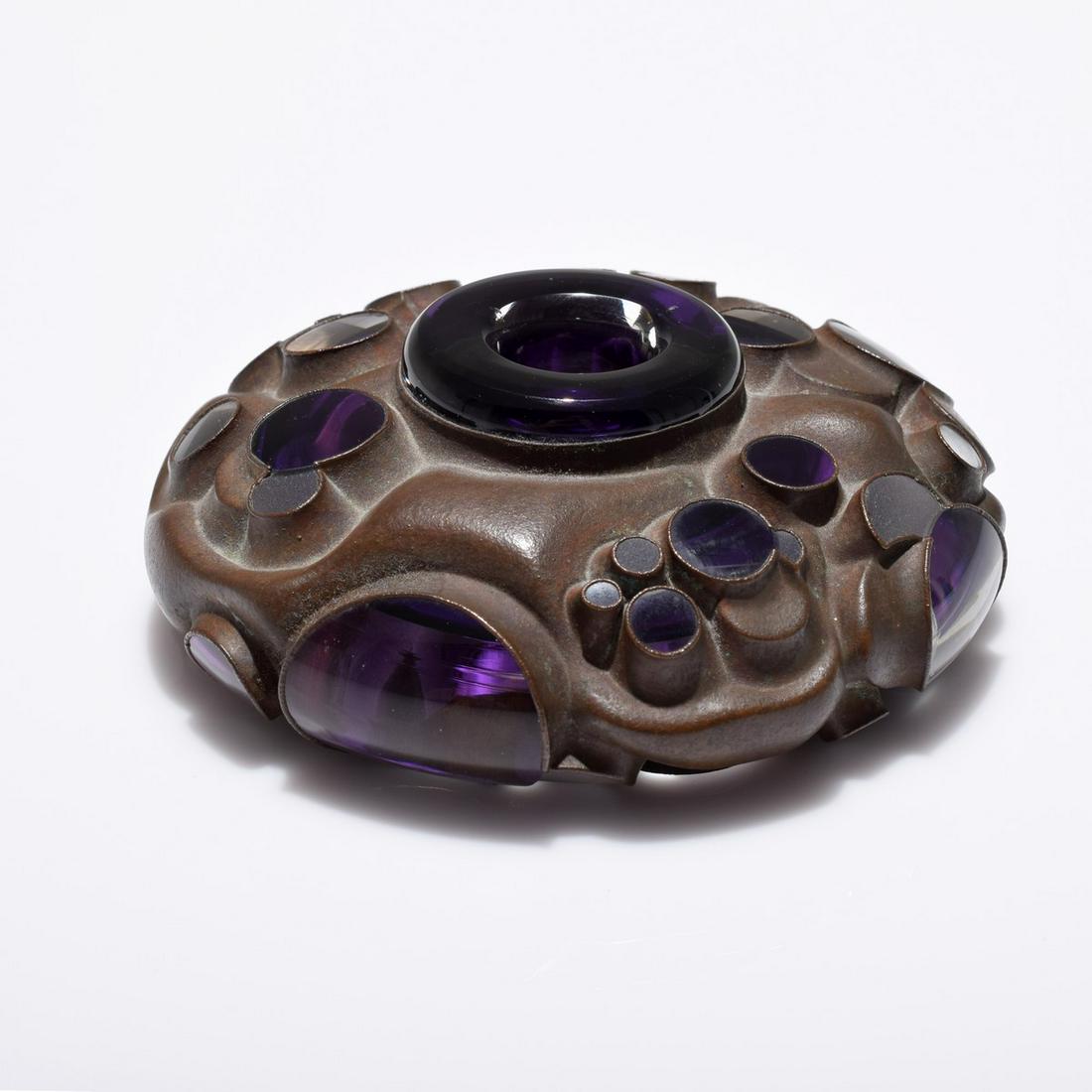 Michael Glancy Work/Sculpture: Artist/Designer; Manufacturer: Michael Glancy (b. 1950) Marking(s); notes: signed (initial) Country of origin; materials: American; glass, metal Dimensions (H, W, D): 2"h, 5