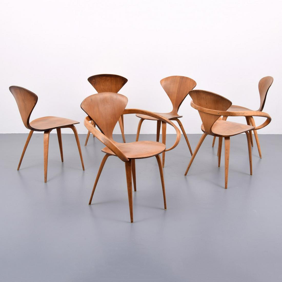 Norman Cherner Dining Chairs, Set of 6: Artist/Designer; Manufacturer: Norman Cherner; Plycraft Marking(s); notes: Plycraft label Country of origin; materials: USA; wood Dimensions (H, W, D): arm chairs: 30.5"h, 2