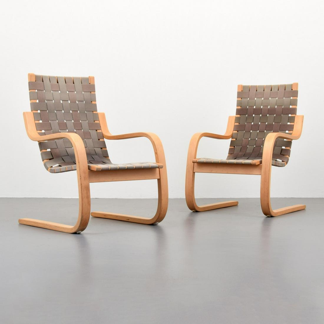 Pair of Alvar Aalto Cantilever Arm Chairs: Artist/Designer; Manufacturer: Alvar Aalto; ICF Marking(s); notes: ICF label Country of origin; materials: Finland; laminated birch, canvas Dimensions (H, W, D): 34.75"h, 23