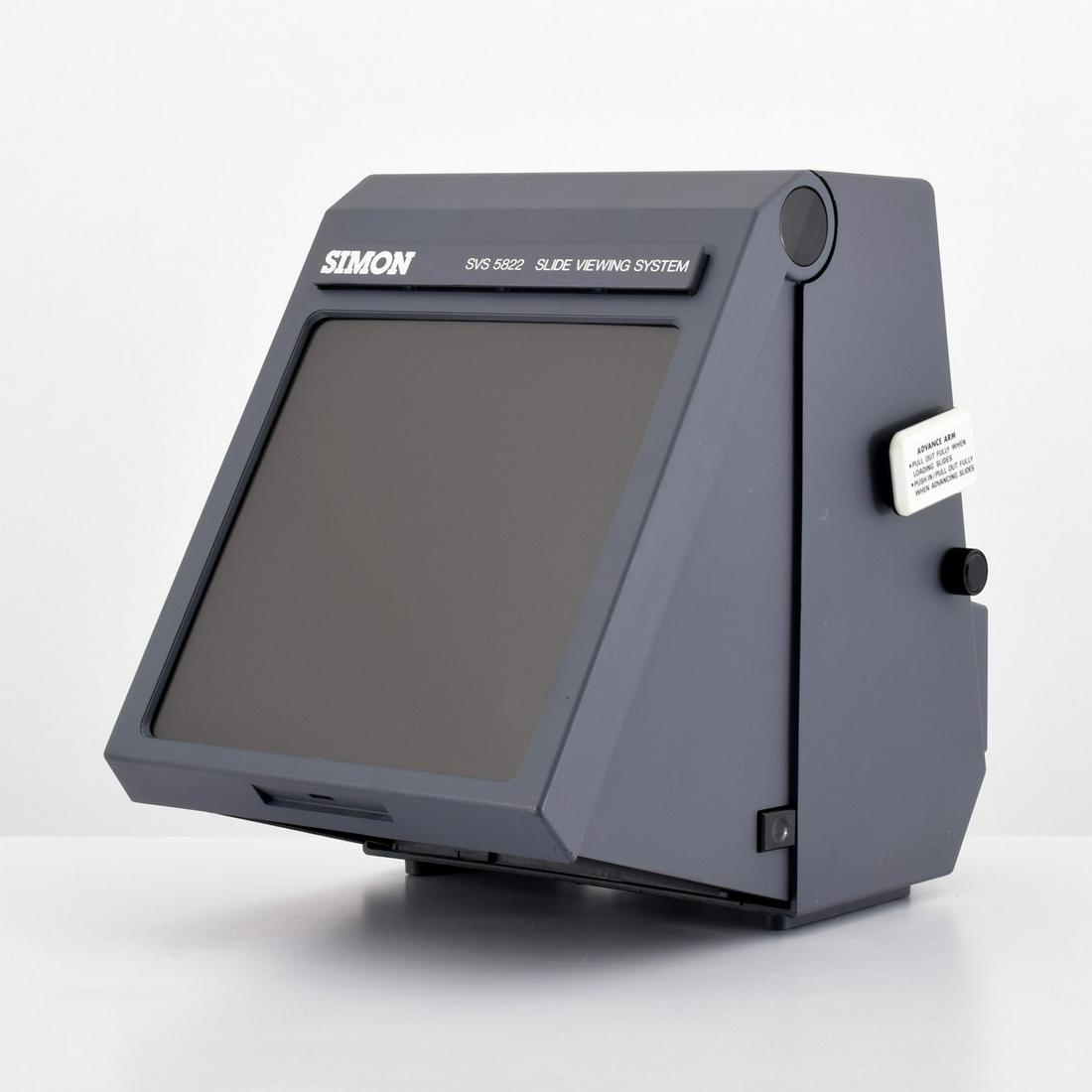 Simon SVS5822 Slide Viewing System: Artist/Designer; Manufacturer: Tim Simon, Inc. Marking(s); notes: marking(s) Country of origin; materials: USA; plastic Dimensions (H, W, D): 13.5"h, 11"w, 19.5"d box
