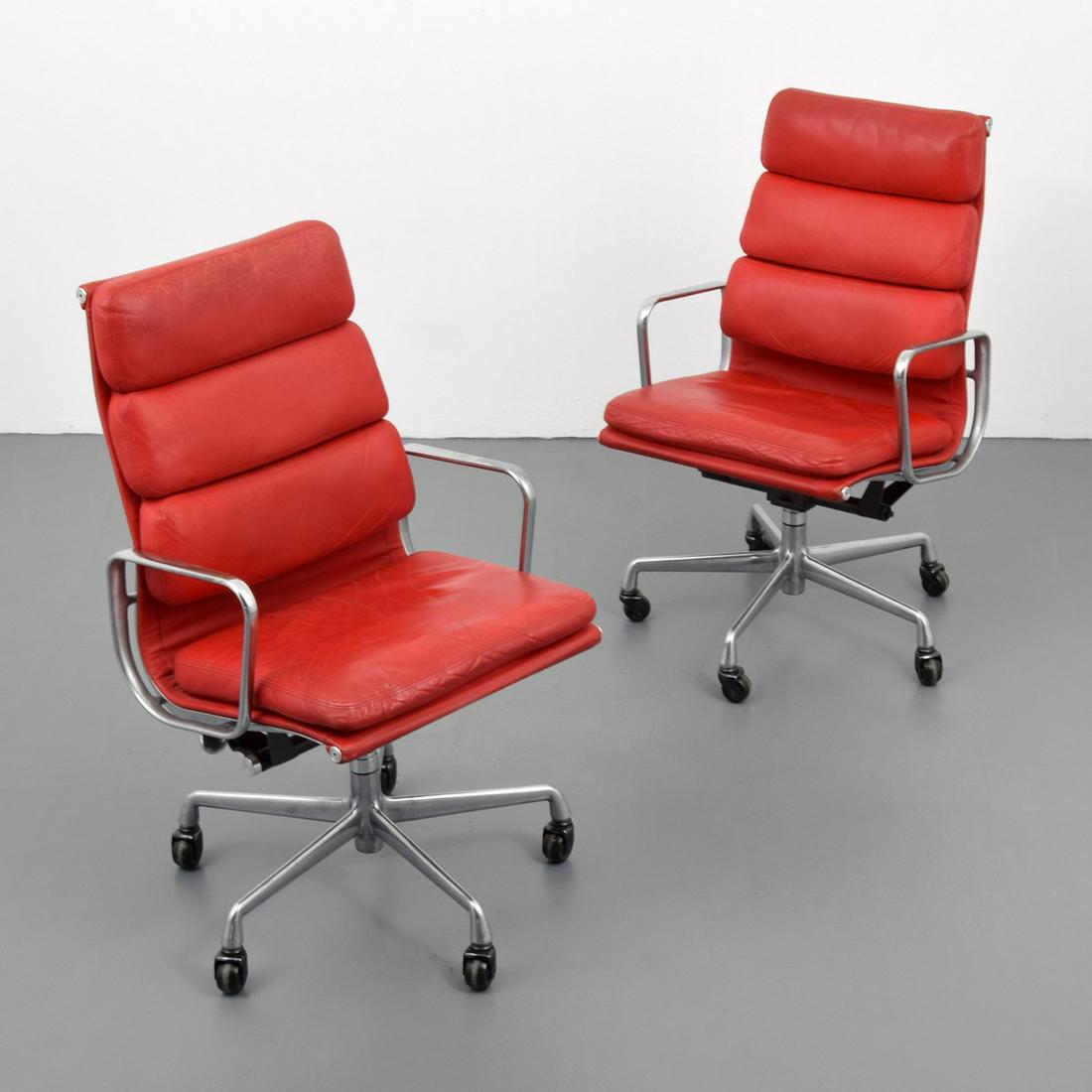 2 Charles & Ray Eames "Soft Pad" Arm Chairs: Artist/Designer; Manufacturer: Charles & Ray Eames; Herman Miller Marking(s); notes: marking(s) Country of origin; materials: USA; polished aluminum, metal, leather Dimensions (H,