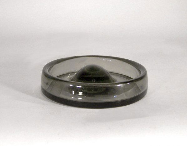 Holmegaard Ashtray/Bowl: Designer & Manufacturer: Holmegaard Country of Origin & Materials: Denmark, glass Additional Information & Circa: holmegaard ashtray/bowl, signed & numbered; circa 1960 Dimensions: 1.5"h x 6.5"dia