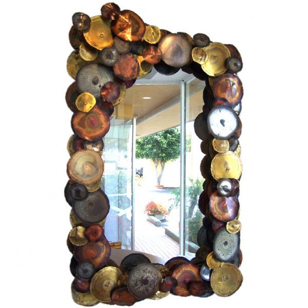 Curtis Jere Mirror: Designer & Manufacturer: Style of Curtis Jere Country of Origin & Materials: USA, metal/mirror Additional Information & Circa: Mirror in the style of Curtis Jere/Silas Seandel. Various shades of coppe