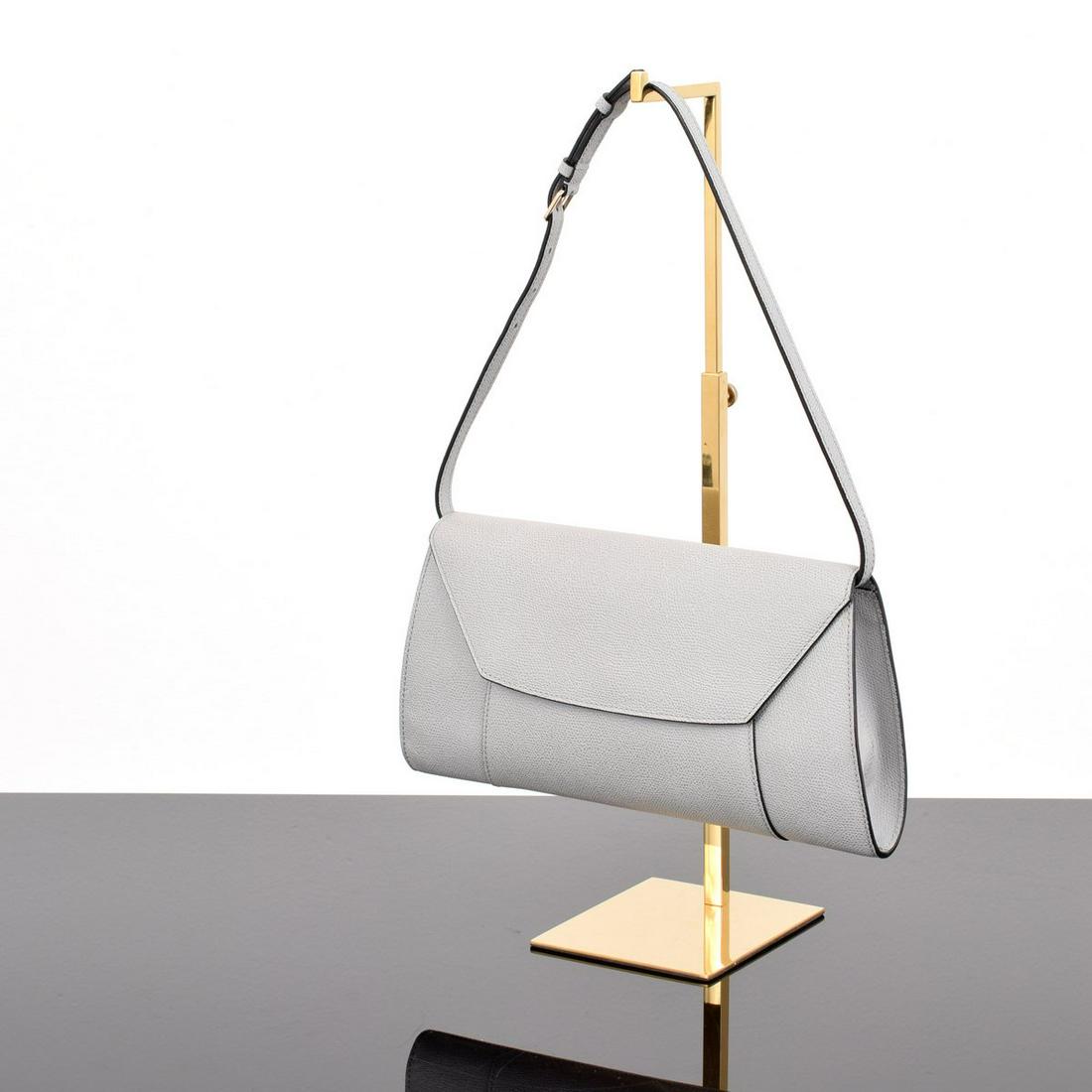Valextra "La Scala" Clutch/Shoulder Bag: Artist/Designer; Manufacturer: Valextra Marking(s); notes: Valextra imprints, no. 398578, marking(s) Country of origin; materials: Italy; leather, metal Dimensions (H, W, D): 6.75"h, 12.5"w, 2"d (Note