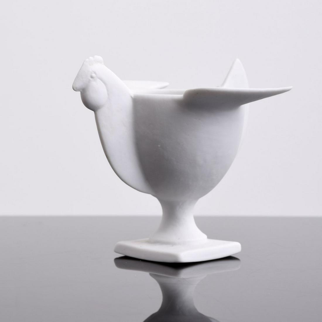 Francois-Xavier Lalanne "Coquetier Poule" Egg Cup: Artist/Designer; Manufacturer: Francois-Xavier Lalanne (1927-2008); Porcelaine de Paris/Artoria Marking(s); notes: signed Country of origin; materials: French; porcelain Dimensions (H, W, D): 3"h, 3.5