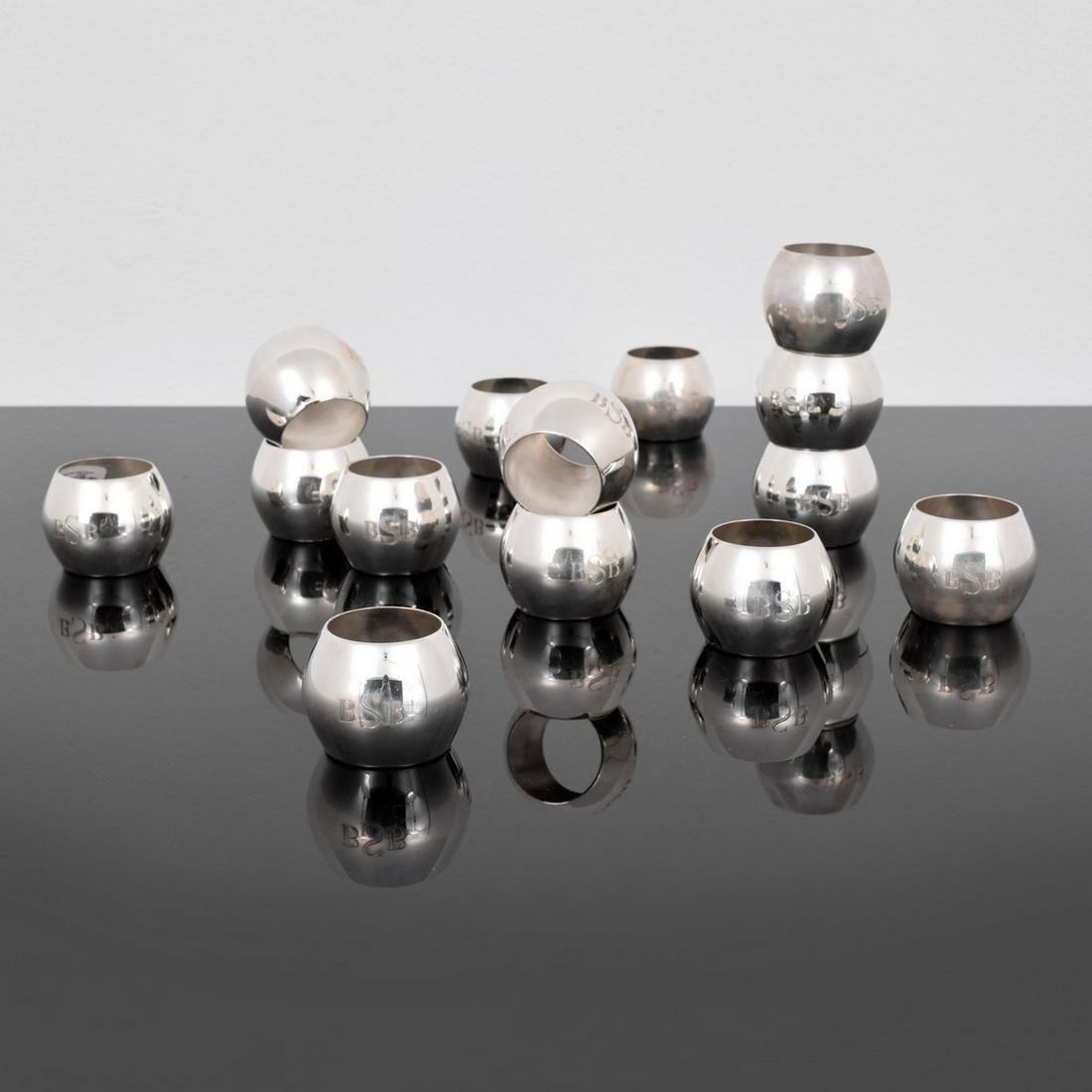 Asprey Sterling Silver Napkin Rings, Set of 14: Artist/Designer; Manufacturer: Asprey International Limited Marking(s); notes: Asprey London, 925, marking(s) Country of origin; materials: UK; sterling silver Dimensions (H, W, D): 2"h, 2.5"dia each;