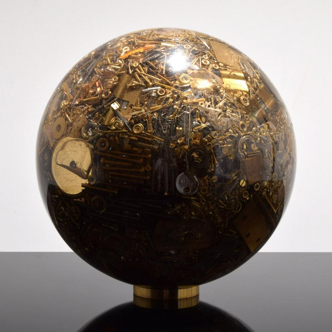 Large Sculpture, Manner of Arman: Artist/Designer; Manufacturer: Arman, manner of Marking(s); notes: no marking(s) apparent Country of origin; materials: country of origin unknown; metal, acrylic Dimensions (H, W, D): 13"dia Additiona