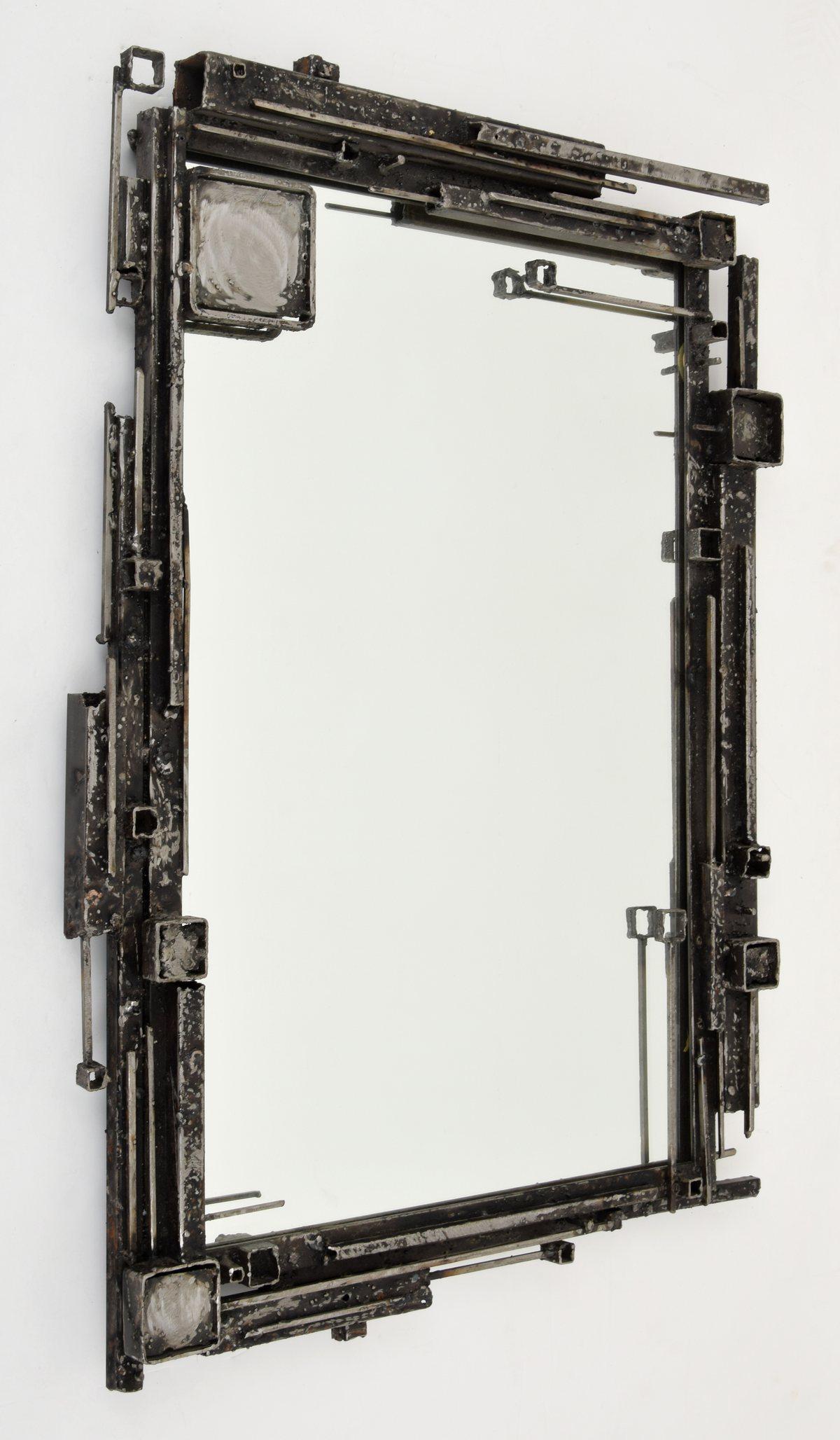 Large James Bearden Brutalist Mirror: Artist/Designer; Manufacturer: James Bearden (b. 1964) Marking(s); notes: signed Country of origin; materials: American; metal, mirrored glass Dimensions (H, W, D): 45.75"h, 31"w Additional Informatio