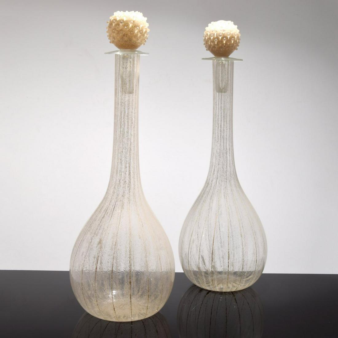 Pair of Large Murano Decanters, Manner of Barbini: Artist/Designer; Manufacturer: Alfredo Barbini, manner of Marking(s); notes: no marking(s) apparent Country of origin; materials: Italy; glass Dimensions (H, W, D): 34"h, 11"dia Additional Information