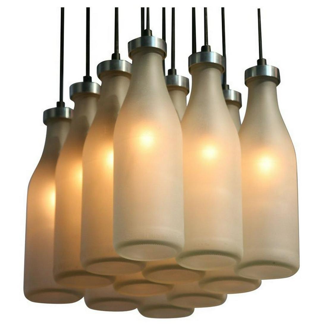 Tejo Remy "Milkbottle" Chandelier: Artist/Designer; Manufacturer: Tejo Remy for Droog Design; DMD Voorburg Marking(s); notes: no marking(s) apparent Country of origin; materials: Netherlands; glass, metal Dimensions (H, W, D): 12"h, 14