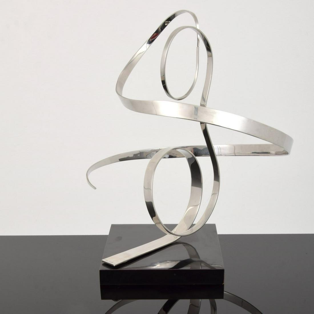 Michael Cutler Abstract Kinetic Sculpture: Artist/Designer; Manufacturer: Michael Cutler (20th Century) Marking(s); notes: signed; 1989 Country of origin; materials: American; chromed metal, marble Dimensions (H, W, D): 24"h, 19.5"dia (sculptu